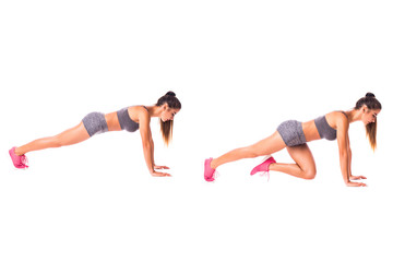 Fototapeta na wymiar Cross Elbow Knee Plank. Young woman doing sport exercise.