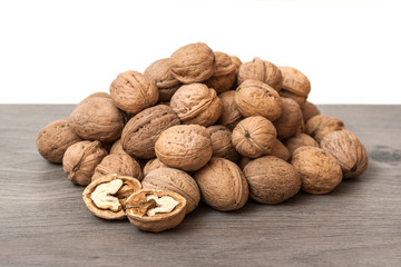Group of walnuts on wooden surface. Natural health food