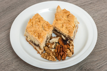 Saintpaulia varieties Lyon's Pirates Treasure with beautiful pink flowers a red border. Close-up.