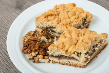 Saintpaulia varieties Lyon's Pirates Treasure with beautiful pink flowers a red border. Close-up.