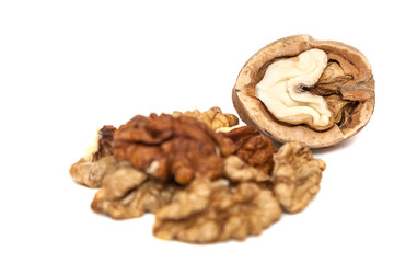 Kernels of walnut close up on white background