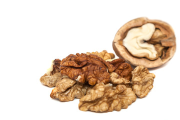 Kernels of walnut close up on white background