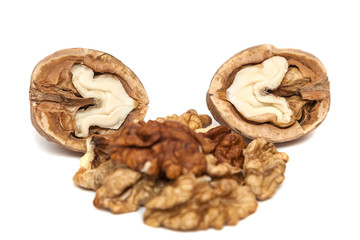 Kernels of walnut close up on white background