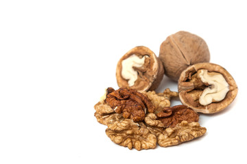 Kernels of walnut close up on white background
