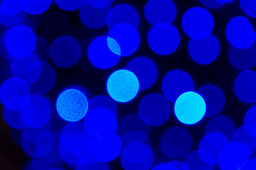 Blurred bokeh blue christmas lights background