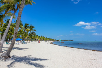 The spectacular beach with fine white sand of Smathers Beach, Key West, Florida. Smathers Beach is Key West's longest beach and is located on the Atlantic Ocean side.
