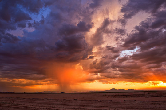 Fototapeta Stormy sky at sunset