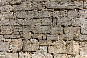 Limestone blocks in the wall of the 2nd century BCE theater of Segesta, Sicily