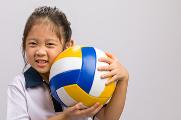Child Holding Ball, Isolated on White