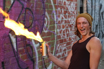 Pyromaniac having fun with flammable can