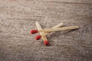 matchsticks on wooden