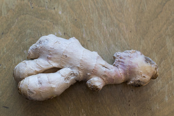 ginger root on wooden table