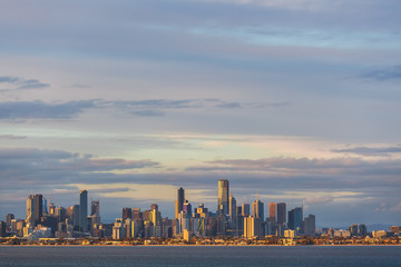 Melbourne CBD skyline at sunset from Port Phillip waters. Melbourne, Australia