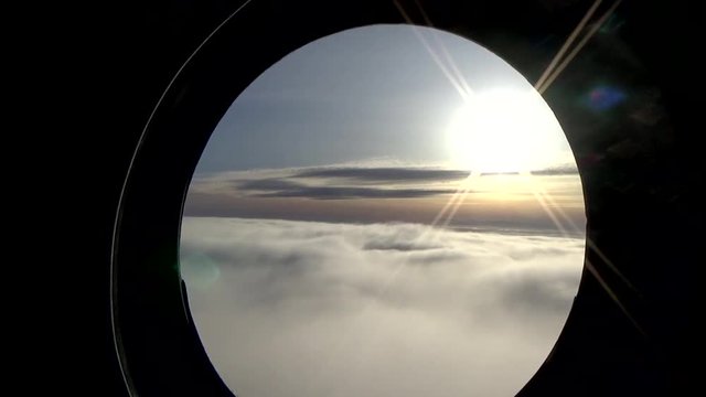 The view from the window of the helicopter. The entrance to the cloud