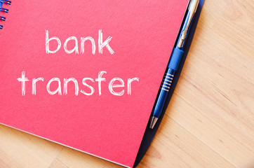 Bank transfer text concept on notebook