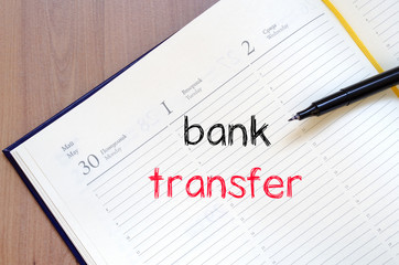 Bank transfer text concept on notebook