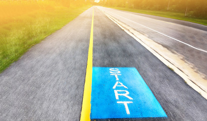 Obraz premium Straight road and the start line on motion blur