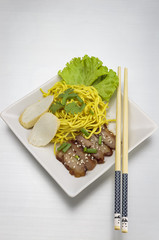 close up on top dry yellow noodle thai food