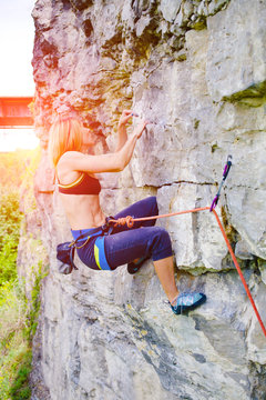 Sport climbing outdoors.