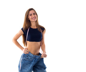 Woman wearing jeans of much bigger size