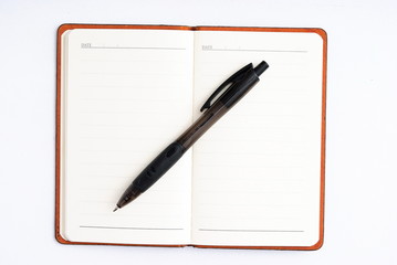 notepad with pen isolated