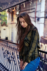 Sad woman standing alone