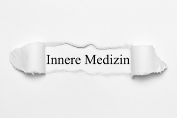 Fototapeta premium Innere Medizin auf weißen gerissenen Papier