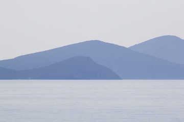 Landscape with water and land in the background - Aegean sea, Greece
