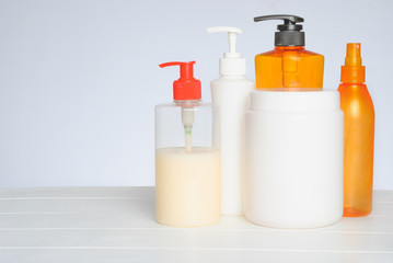 Group of cosmetic bottles isolated on white