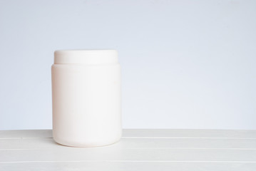 White cosmetic bottle
