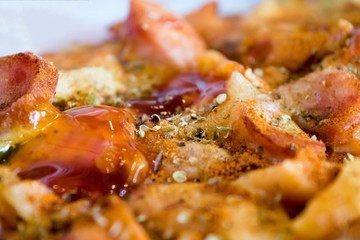 Photo, appetizing pizza with sausage, cheese, tomatoes and mayon