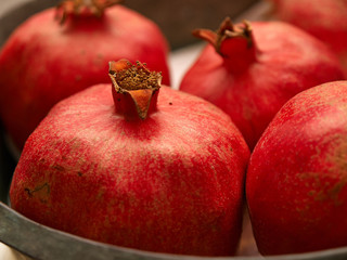 Ripe pomegranate in a bowl