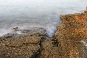 Aegean shore in Greece, Thassos island - waves and rocks - long exposure photography