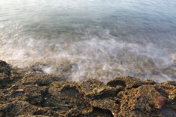 Aegean shore in Greece, Thassos island - waves and rocks - long exposure photography