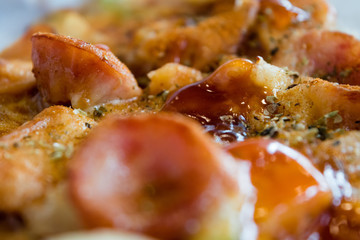 Photo, appetizing pizza with sausage, cheese, tomatoes and mayon