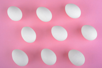 white eggs on pink