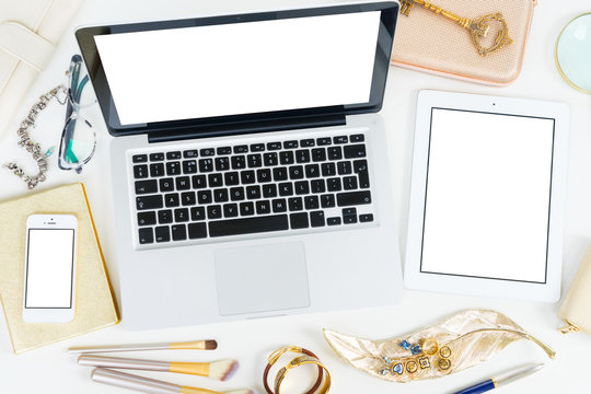 Laptop, tablet and phone with golden woman accessories mock up flat lay styled scene, top view, copy space on blank screen background
