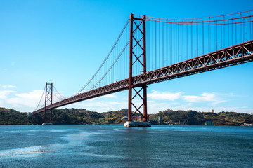 Famous 25 de Abril bridge over Tagus in Lisbon, Portugal