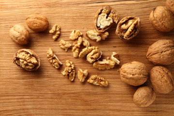 Walnut on a cutting board made of oak/ Walnut on a cutting board made of oak