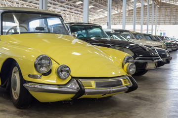 Plakat retro and classic car in big garage