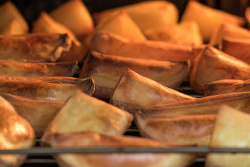 Process of baking potato / Baking potato slices on grill in oven 