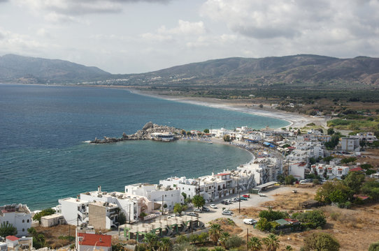 Haraki village and Haraki Bay, Rhodes Island, Greece. Haraki is the seaside village on the Greek island of Rhodes, in the Dodecanese. It is situated on Haraki Bay, on the eastern coast. 