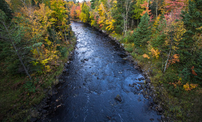 Michigan Wilderness River Overlook. Sturgeon River winds through the autumn wilderness of Michigan.