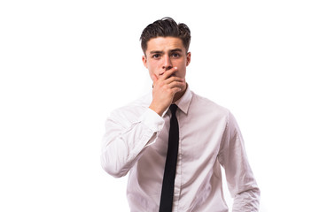 Portrait of a  businessman touching his chin over white background