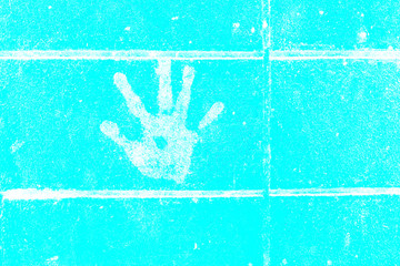 Fingerprint on the wall in the city, hand stamp on wall old,public place
