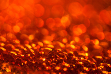 Dark red blurred background with bokeh hexagonal