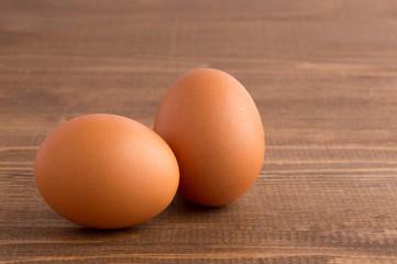 Eggs on wooden background