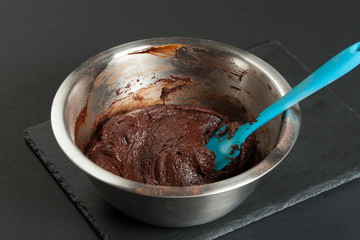 Cooking Process Of Brownies. Preparation Stage. Raw Dough In Bow