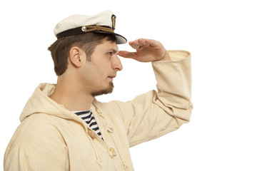 Travel and marine concept - man in captain hat