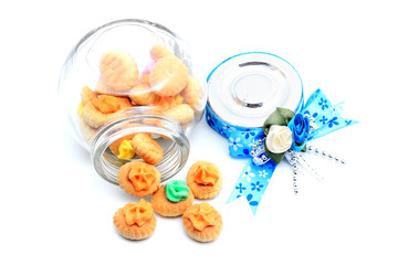 Meringue Button Cookies in the bottle with blue ribbon for gift
